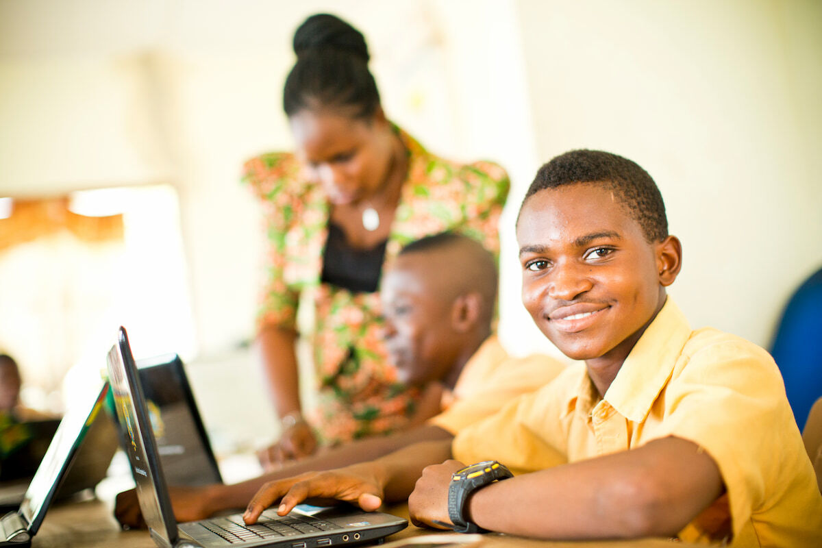 Students on a computer, exam registration portal